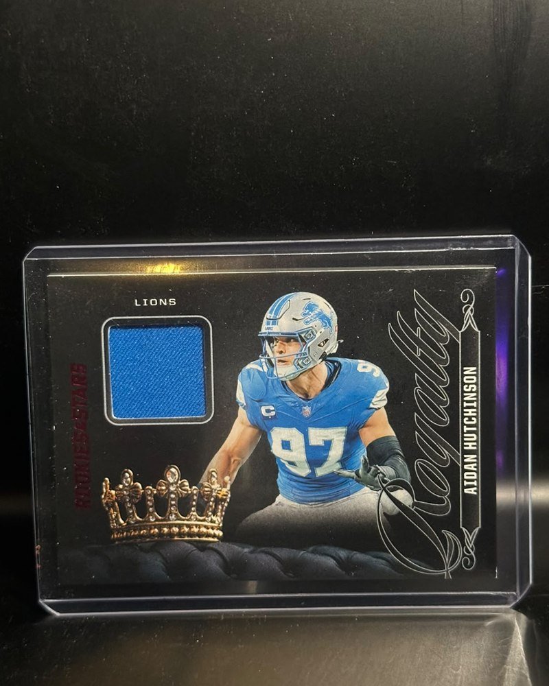 Lions · Panini Rookies & Stars 2025, R-AHN, con pieza de jersey (no de un partido específico)