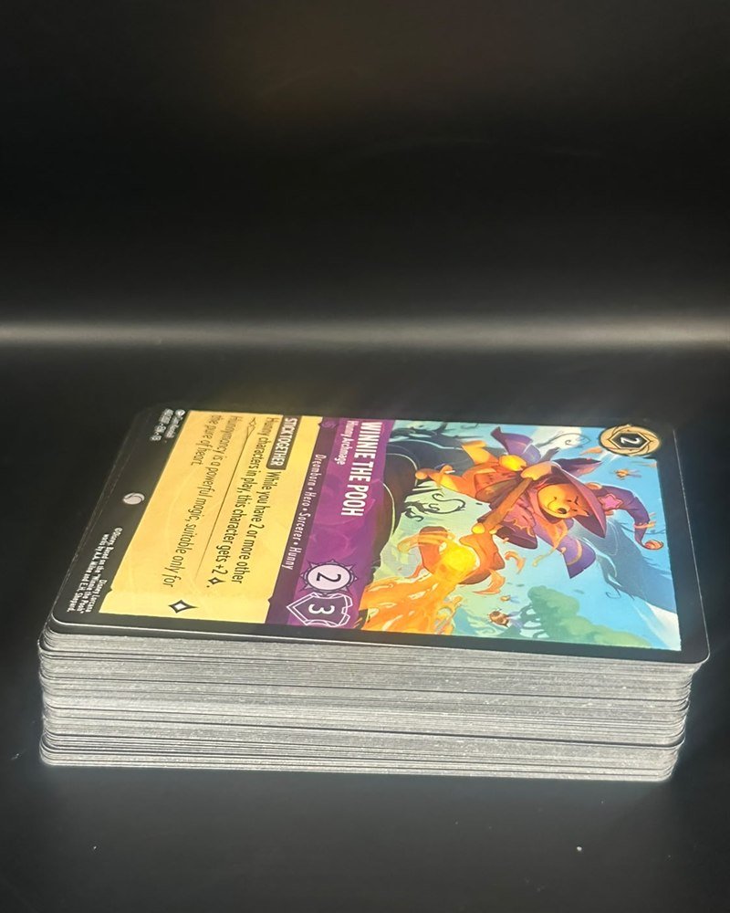 50 cartas random de Lorcana, sin funda. Promo: posible hit escondido de $200 o más
