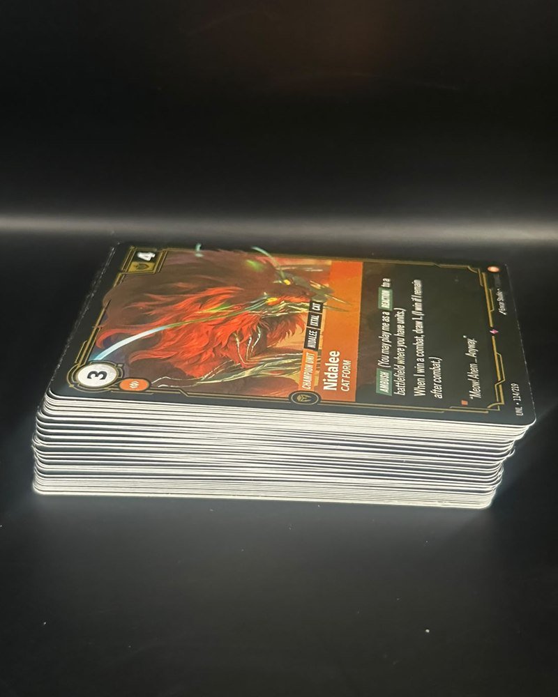 50 cartas random de Riftbound, sin funda. Promo: posible hit escondido de $200 o más