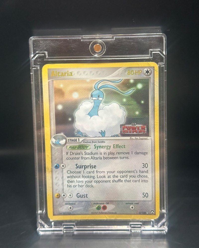 EX Power Keepers 2/108, Rare, reverse holo con sello del set. Incluye estuche magnético de protección 100pt