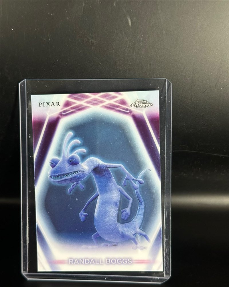 Monsters, Inc. (Pixar) · Topps Disney Neon 2026, variante Chrome Neon Etch CNE-120